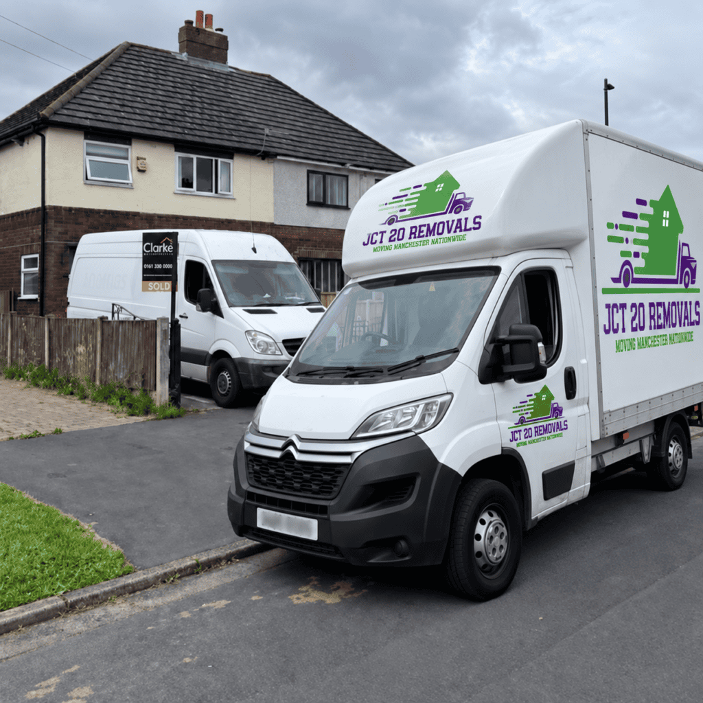 JCT 20 Removals branded van parked outside a sold house in Manchester